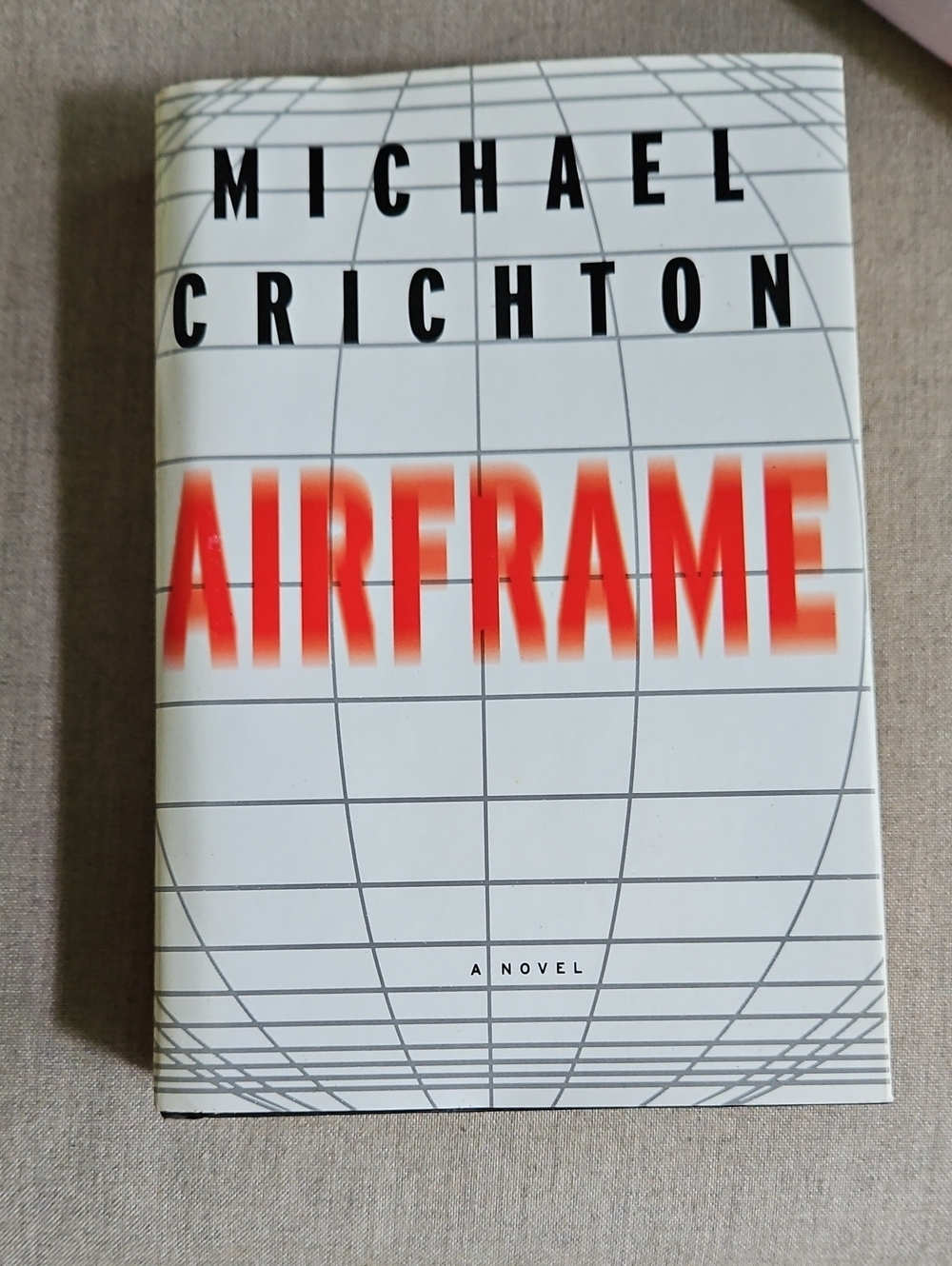 "Airframe" Michael Crichton Hardcover Book - White with Red Accent